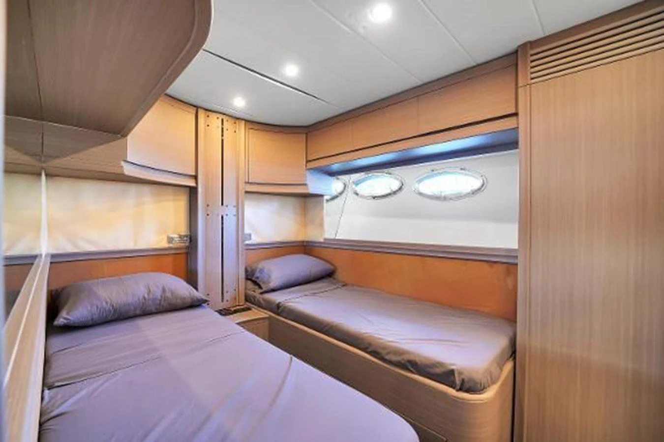 a room with two beds aboard GHOST Yacht for Sale