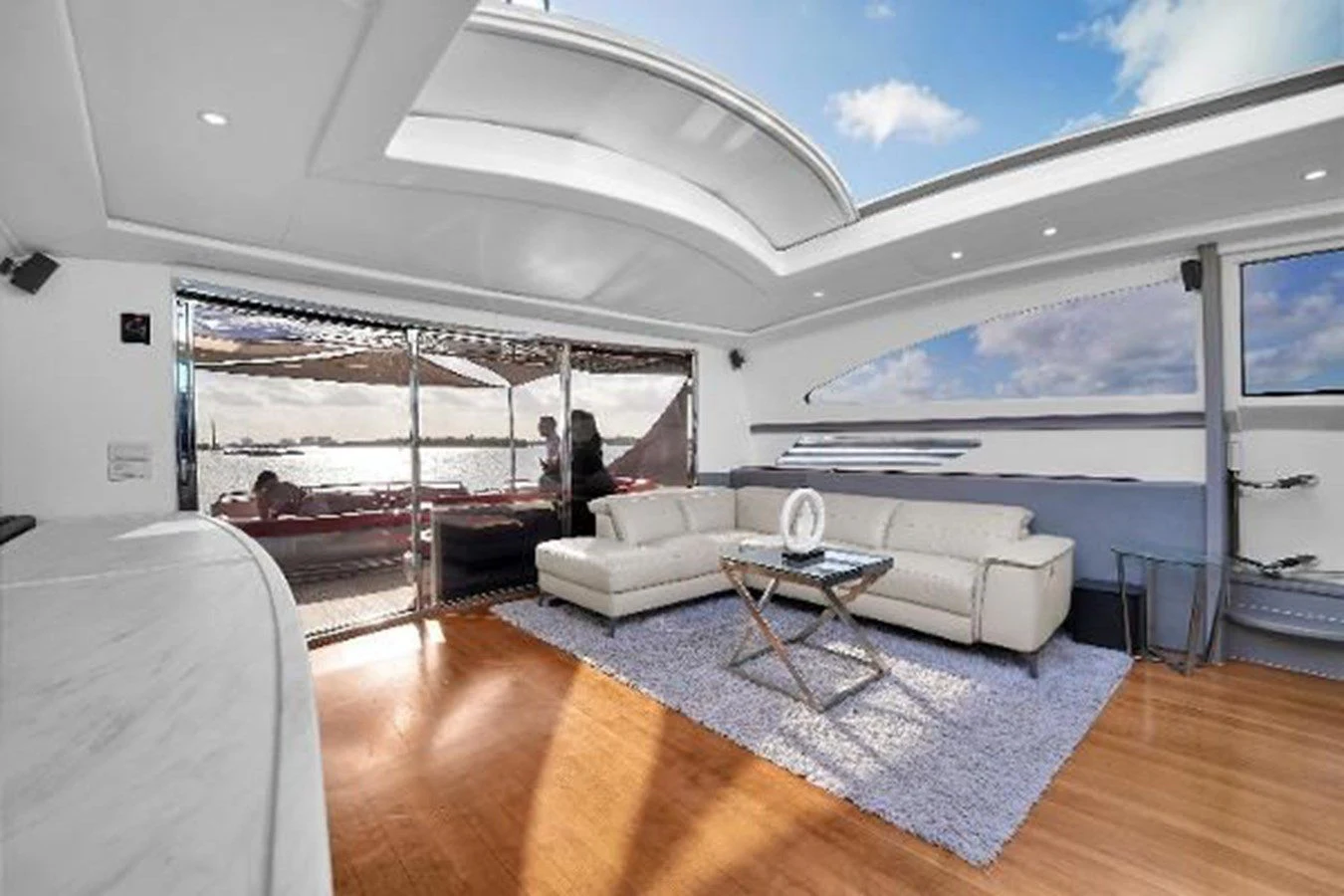 a living room with a large window aboard GHOST Yacht for Sale