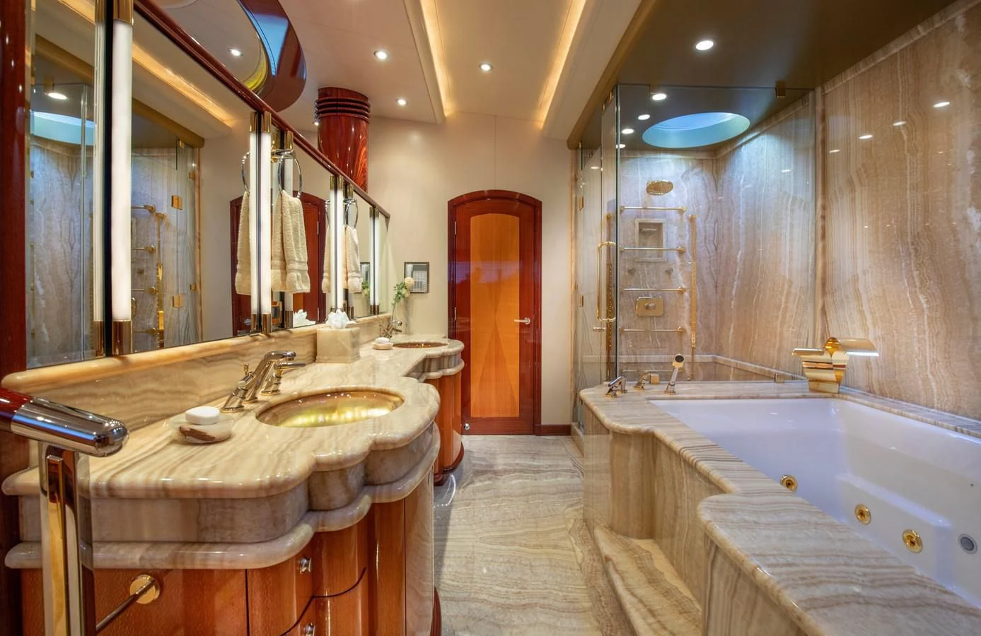 a bathroom with a large bathtub aboard DRIVEN Yacht for Sale