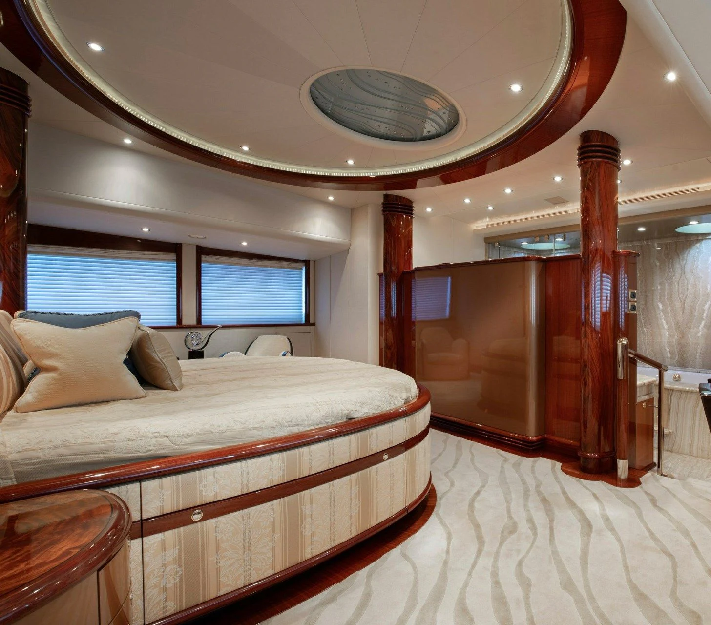 a bed in a room aboard DRIVEN Yacht for Sale