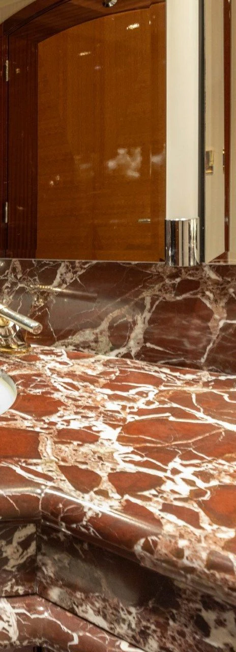 a brick wall with a door aboard DRIVEN Yacht for Sale