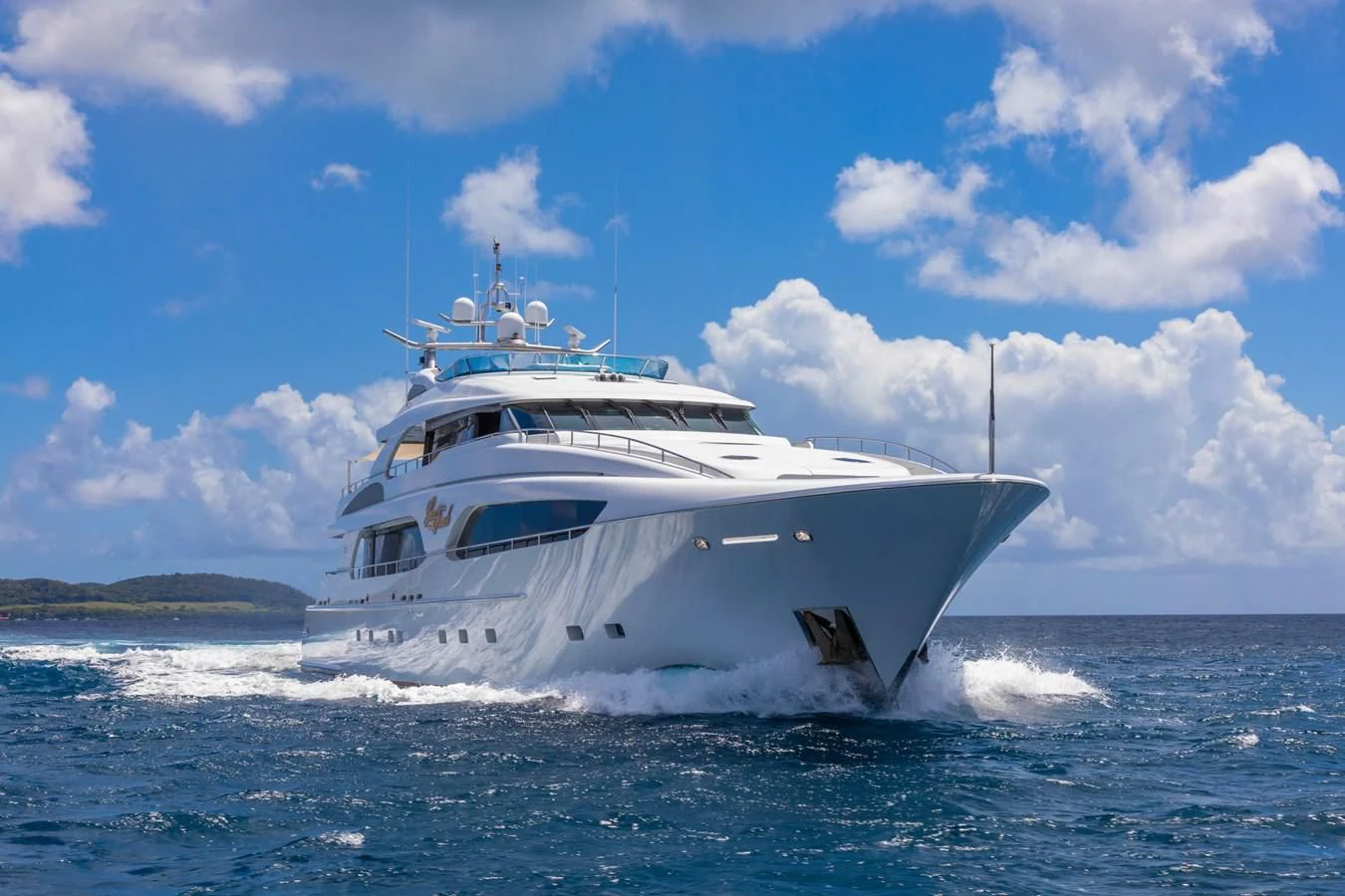 a white yacht on the water aboard DRIVEN Yacht for Sale
