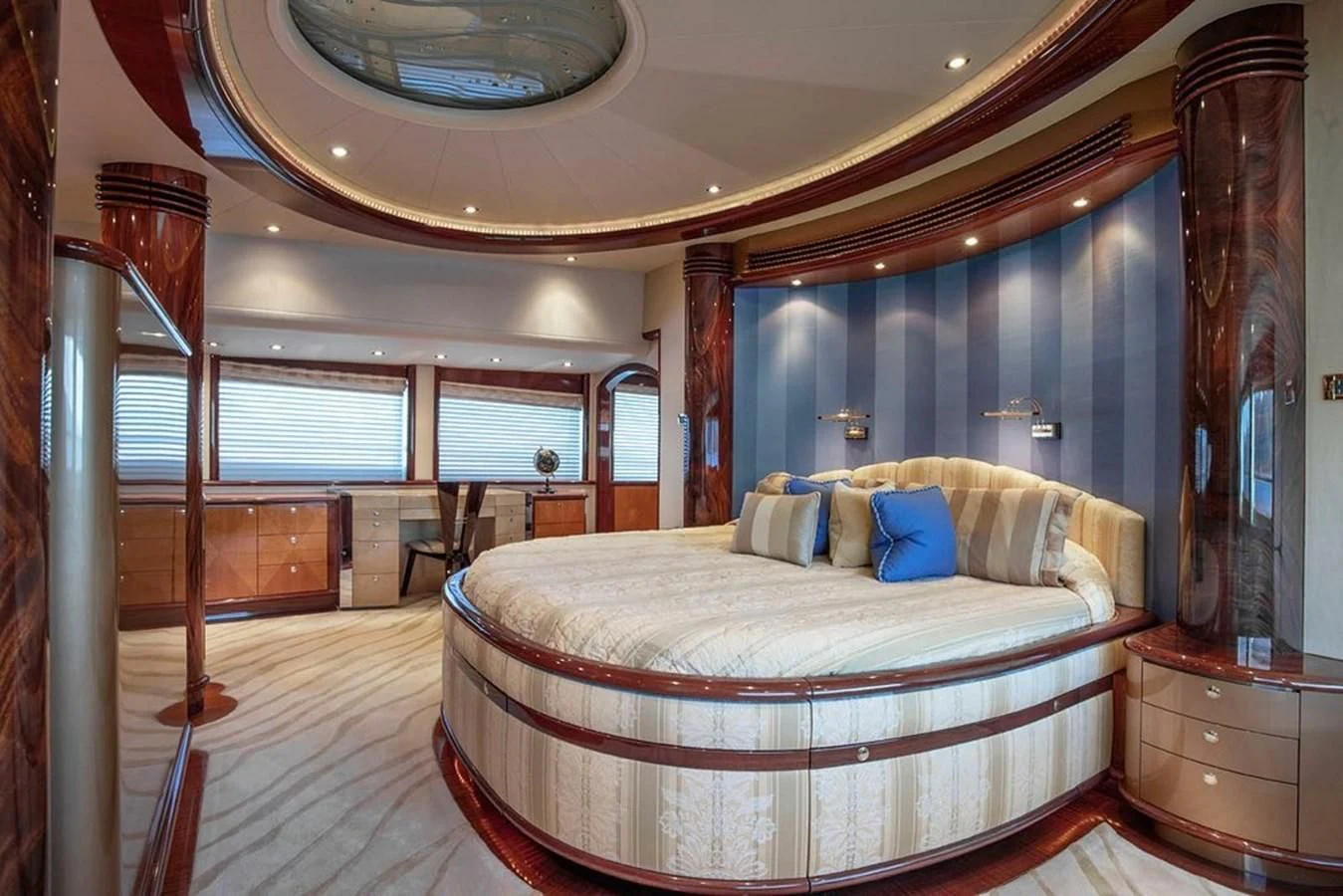 a large bed in a room aboard DRIVEN Yacht for Sale