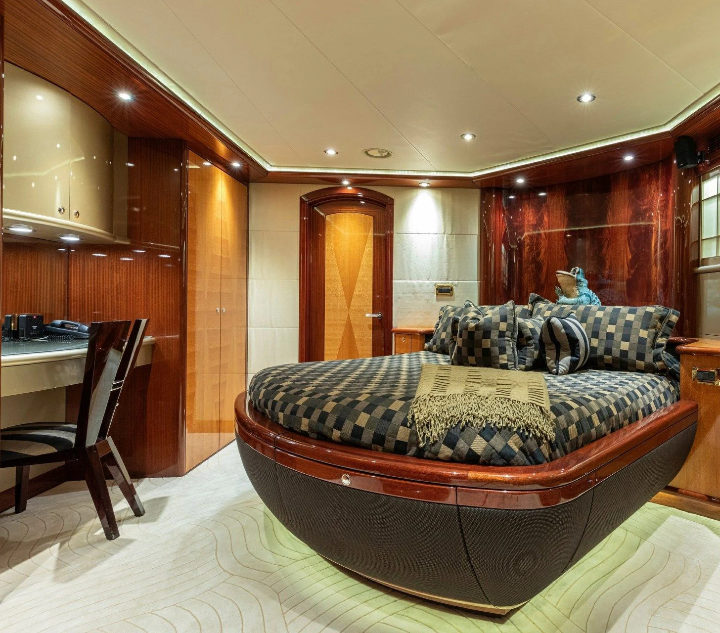 a bed in a room aboard DRIVEN Yacht for Sale
