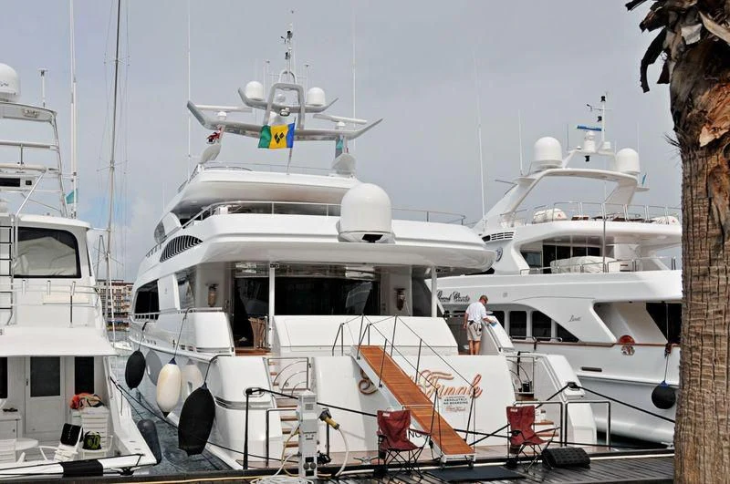 a boat docked at a pier aboard DRIVEN Yacht for Sale
