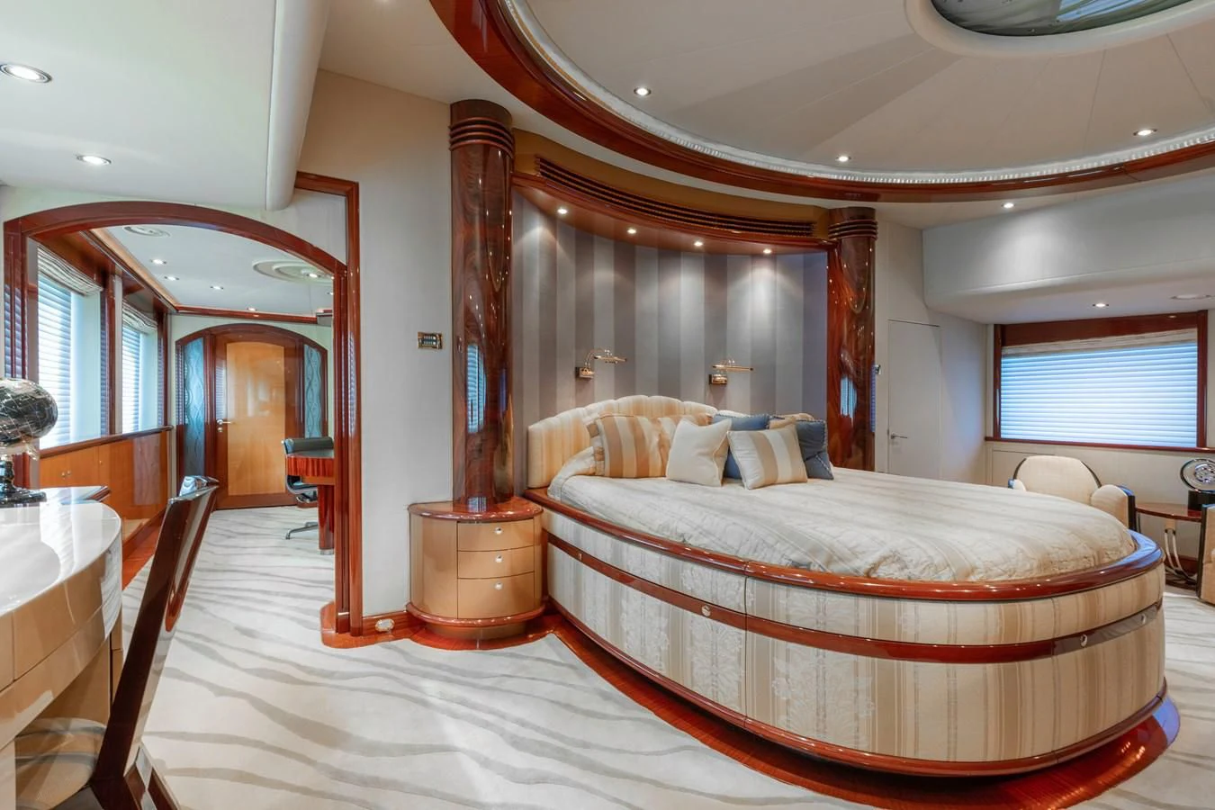 a large bed in a room aboard DRIVEN Yacht for Sale