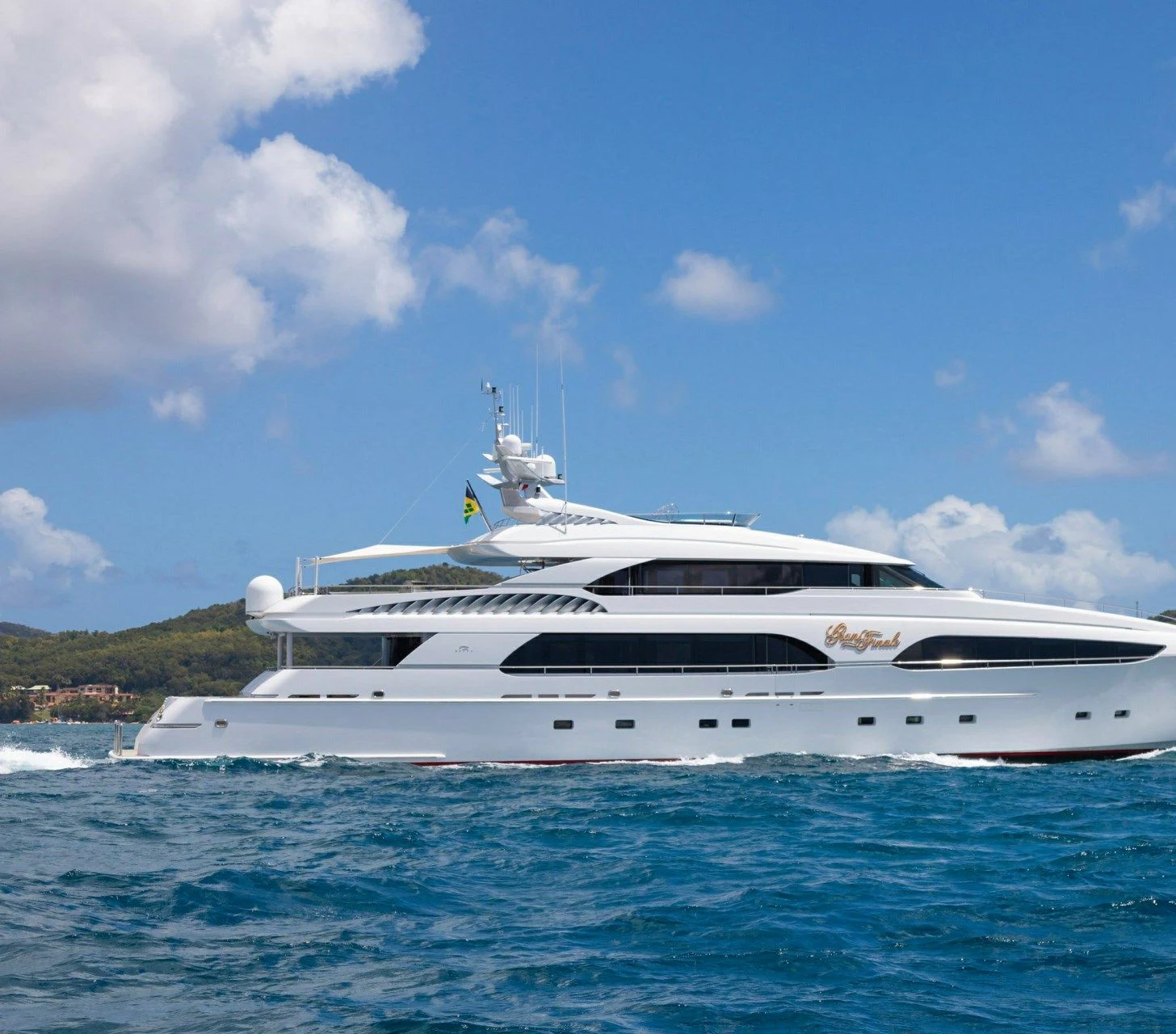 a white yacht in the water aboard DRIVEN Yacht for Sale