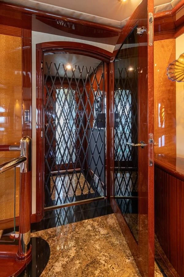 a large glass door aboard DRIVEN Yacht for Sale