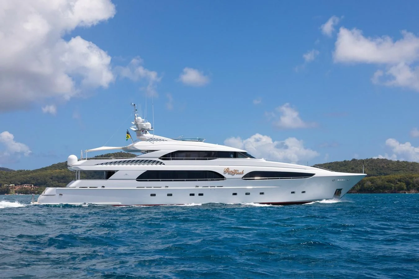 a white yacht in the water aboard DRIVEN Yacht for Sale