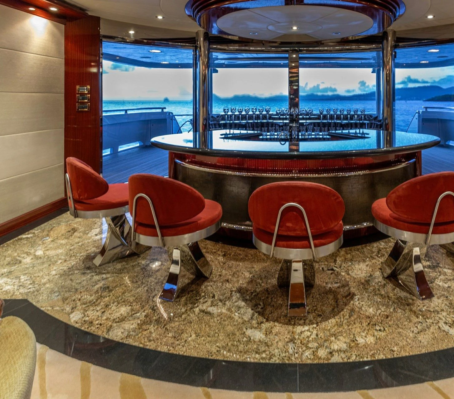 a room with a table and chairs aboard DRIVEN Yacht for Sale