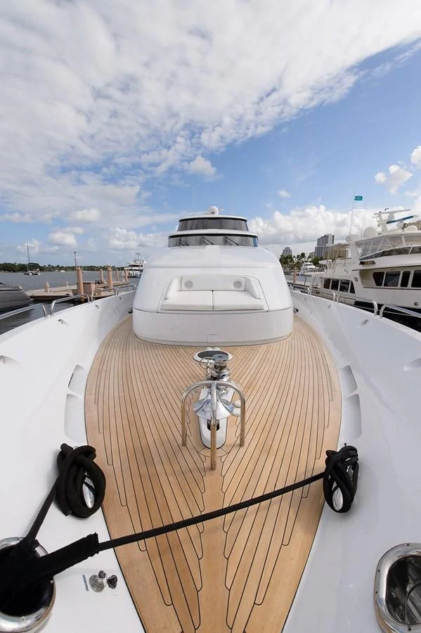 a boat with a steering wheel aboard BIG WAVE Yacht for Sale