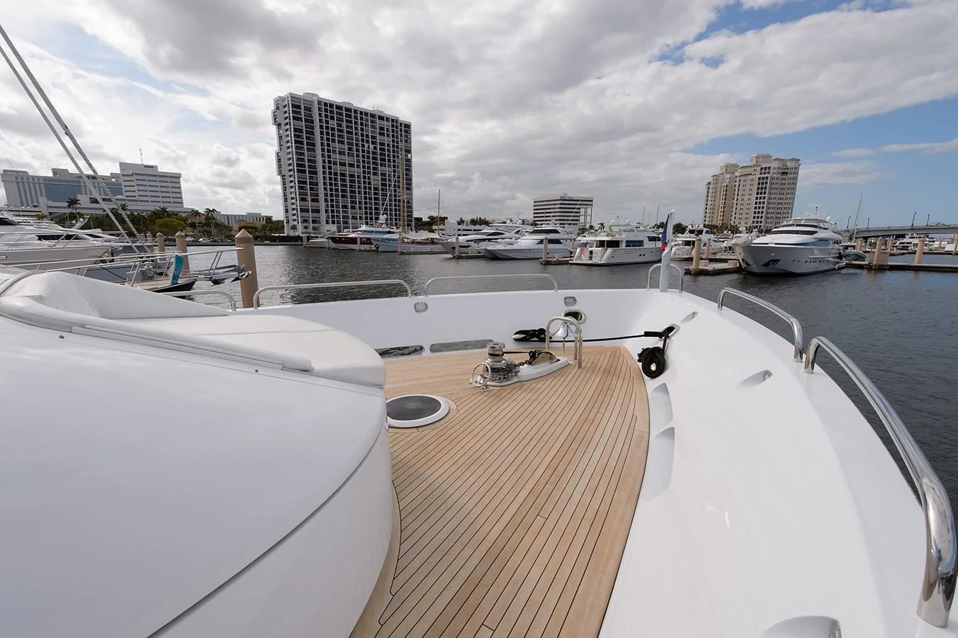 a boat in a harbor aboard BIG WAVE Yacht for Sale