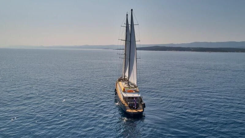 a sailboat in the water aboard DALMATINO Yacht for Sale