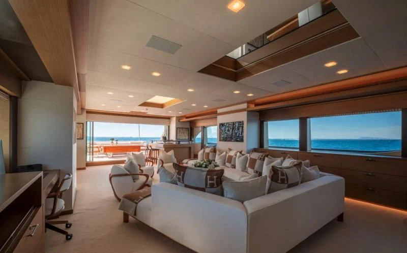 a living room with a large window aboard QHT Yacht for Sale