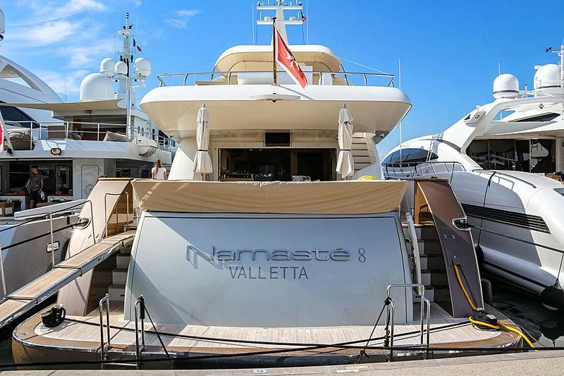 a boat with a sign on the front aboard QHT Yacht for Sale