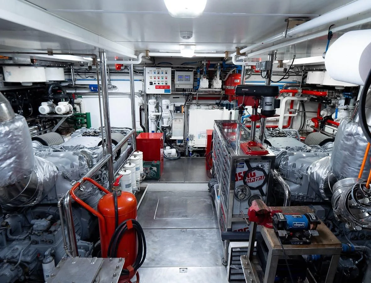 a room full of machinery aboard QHT Yacht for Sale