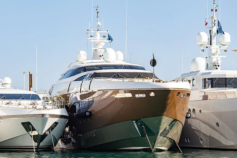 a group of boats in a harbor aboard QHT Yacht for Sale