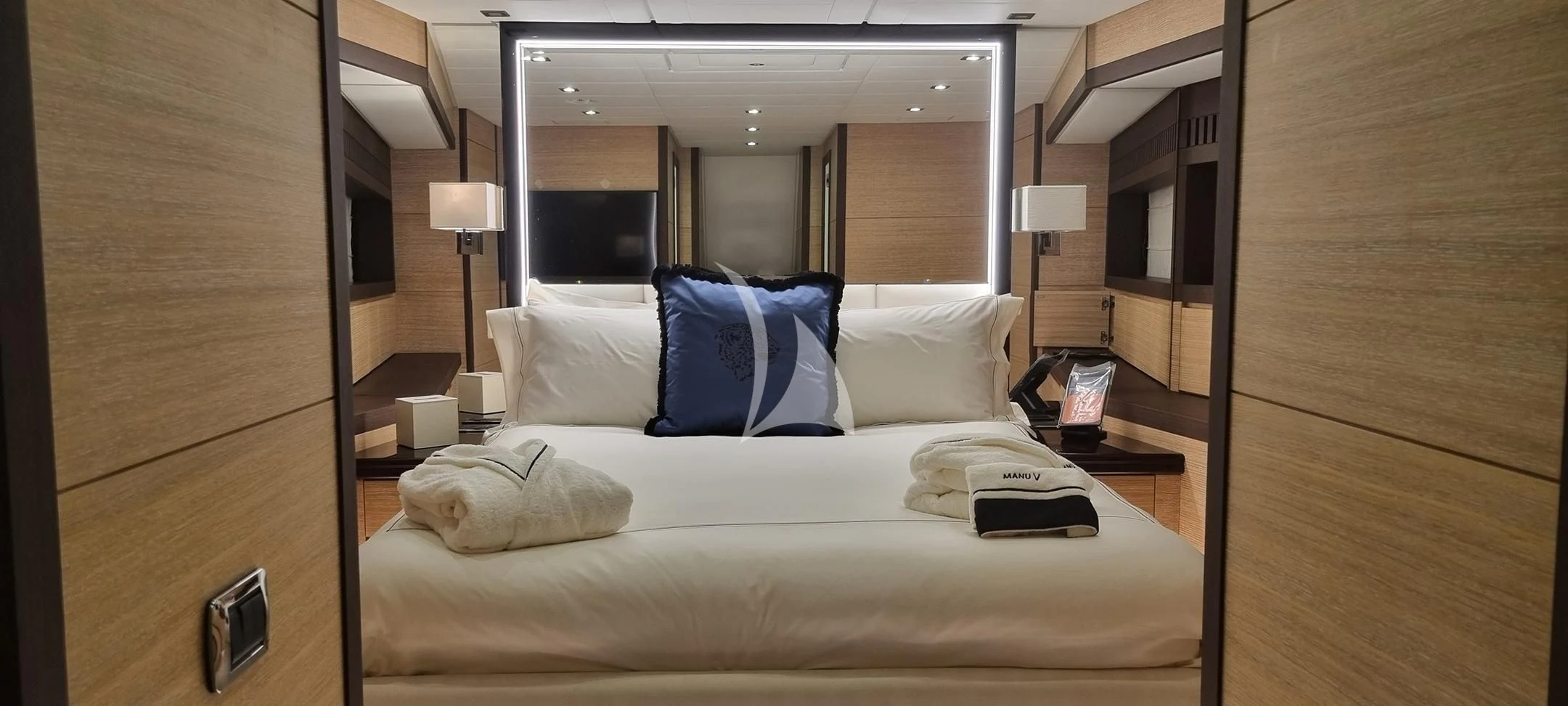 a hotel room with a bed aboard MANU V Yacht for Sale