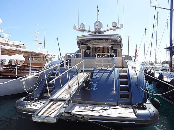 a boat docked at a pier aboard MANU V Yacht for Sale