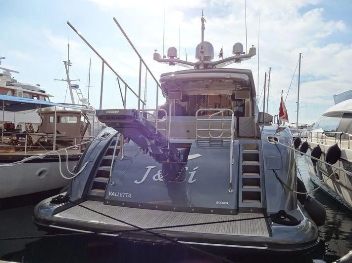 a boat on a deck aboard MANU V Yacht for Sale