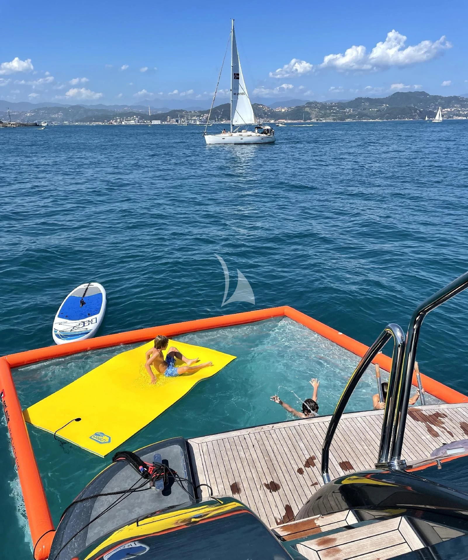 a person on a boat aboard MANU V Yacht for Sale