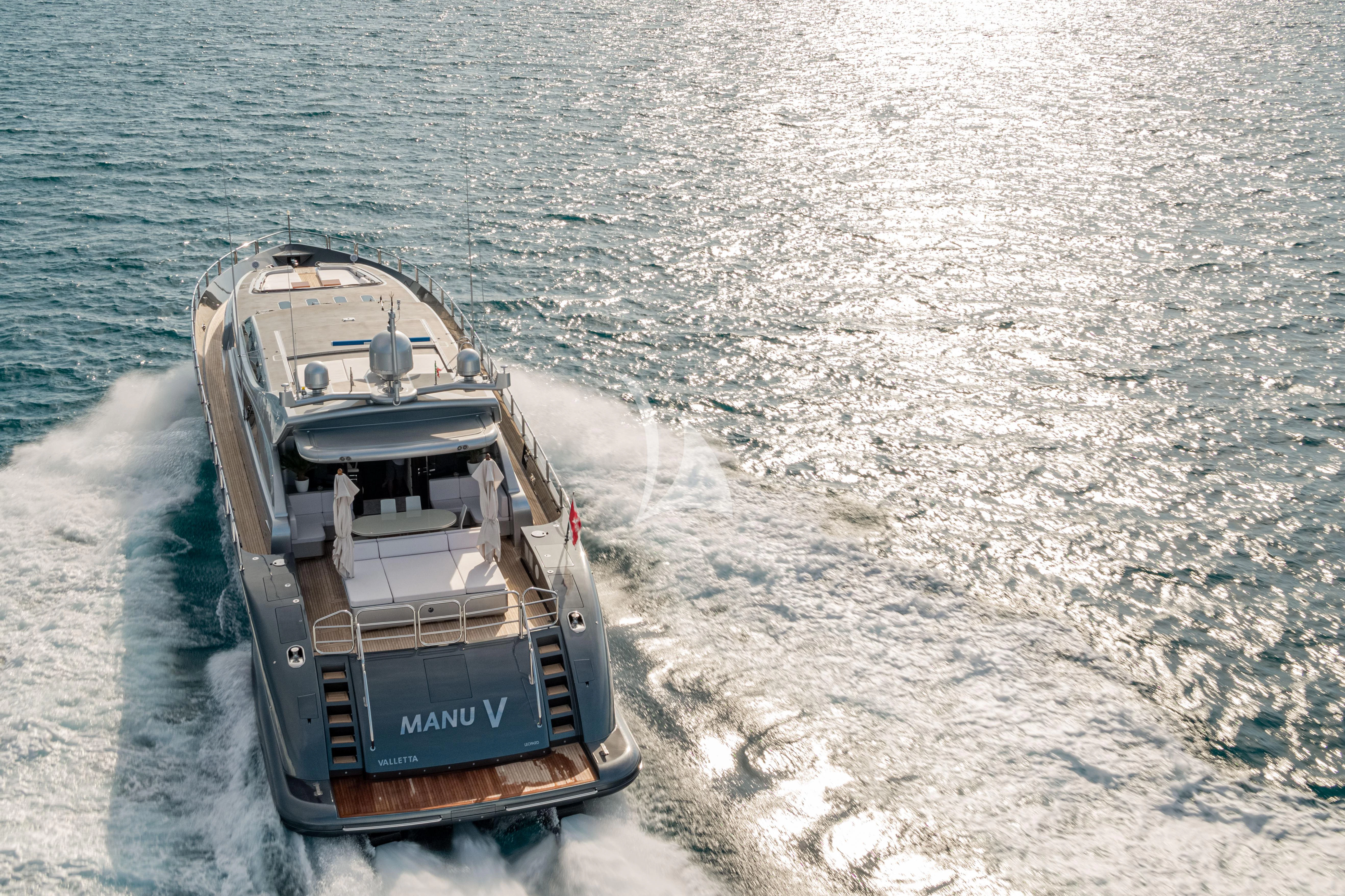 a boat on the water aboard MANU V Yacht for Sale