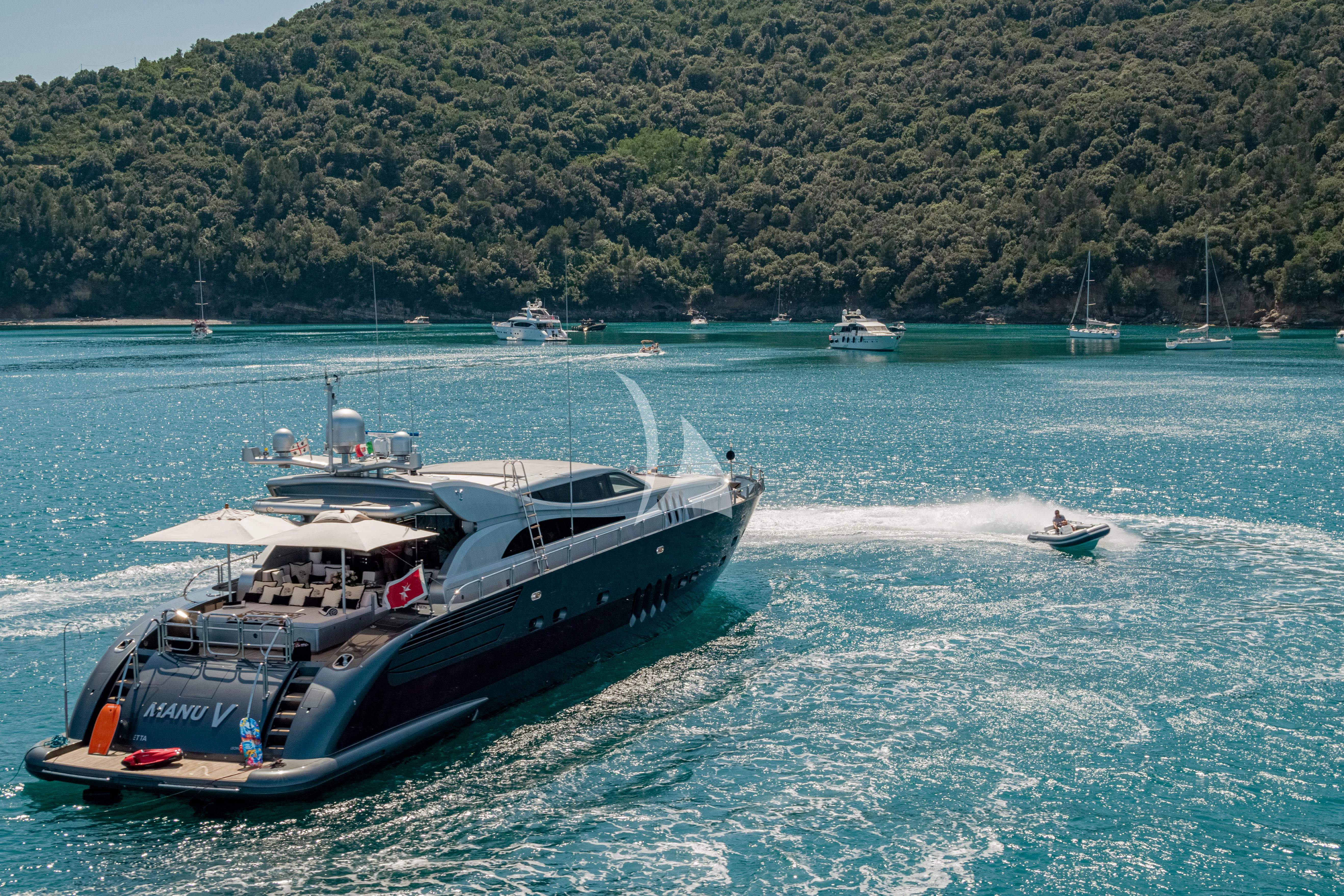 a boat in the water aboard MANU V Yacht for Sale