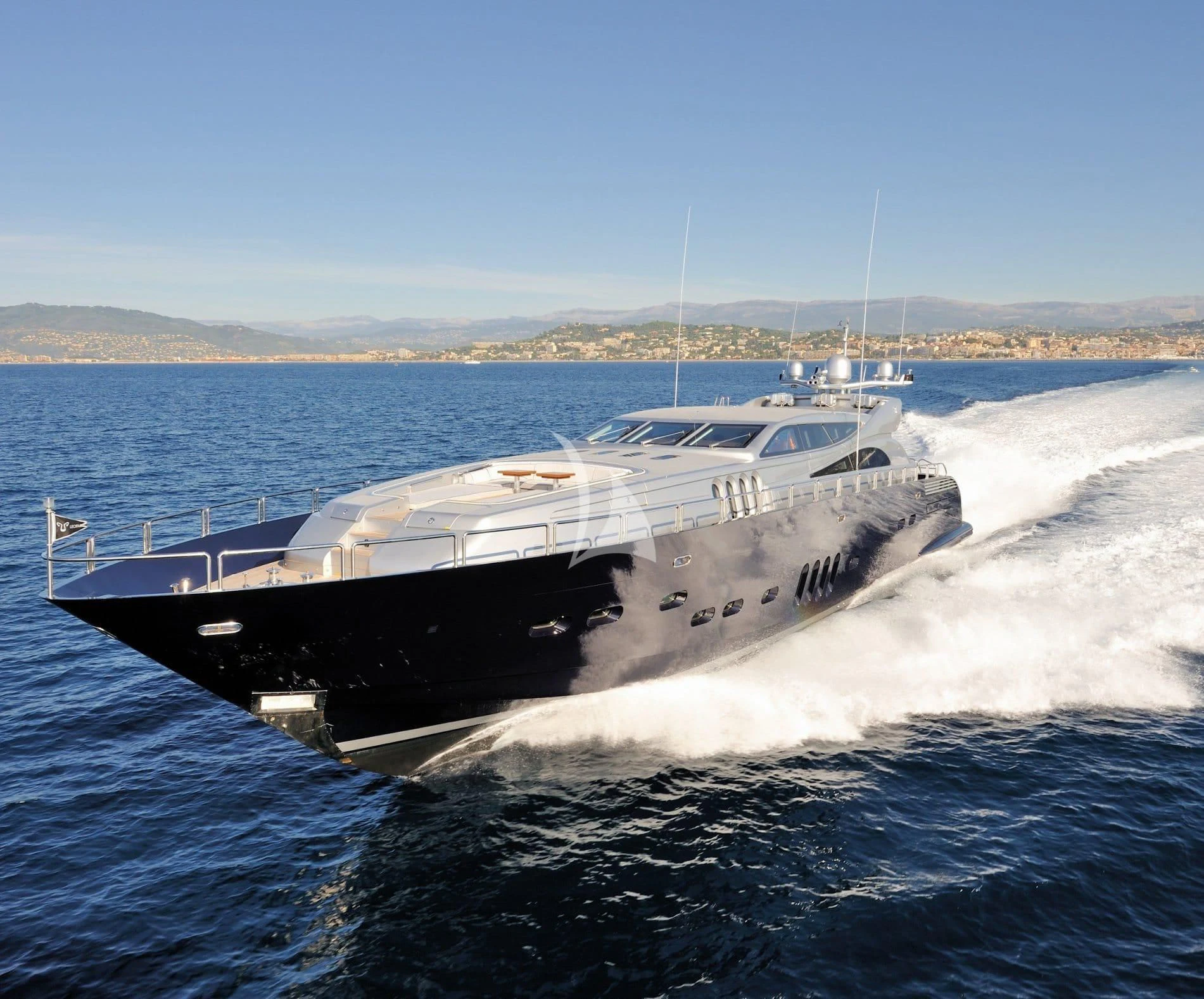 a large ship on the water aboard MANU V Yacht for Sale