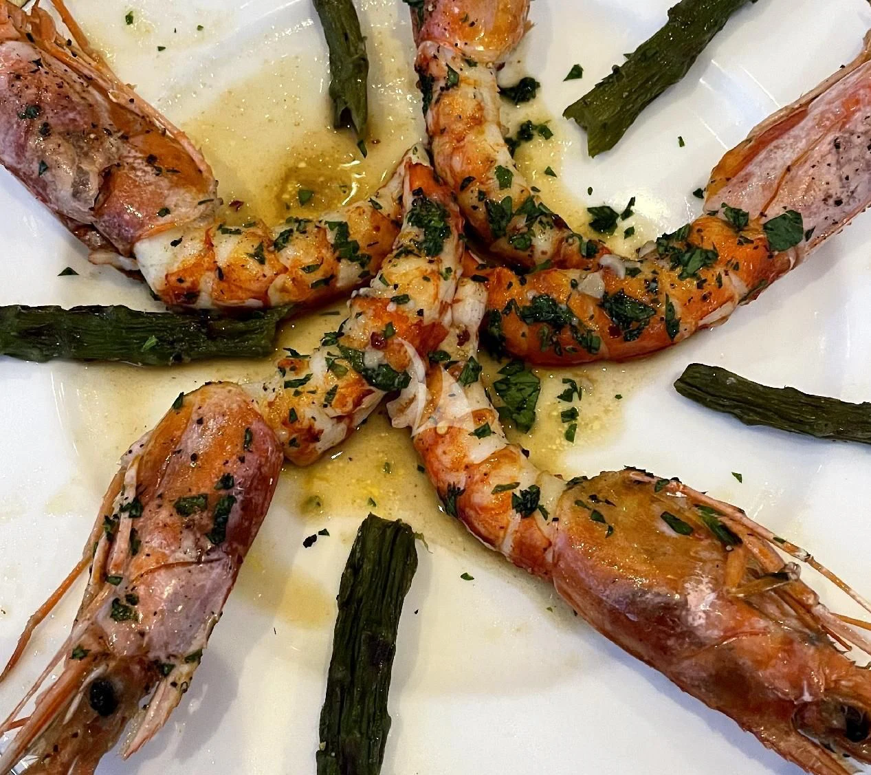 a plate of food aboard MANU V Yacht for Sale