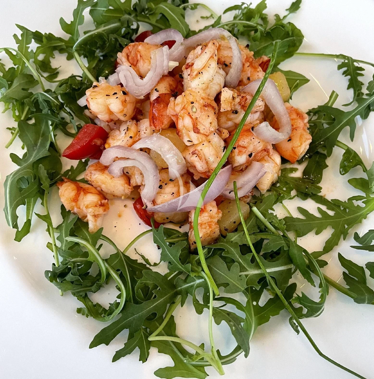 a salad with meat and vegetables aboard MANU V Yacht for Sale