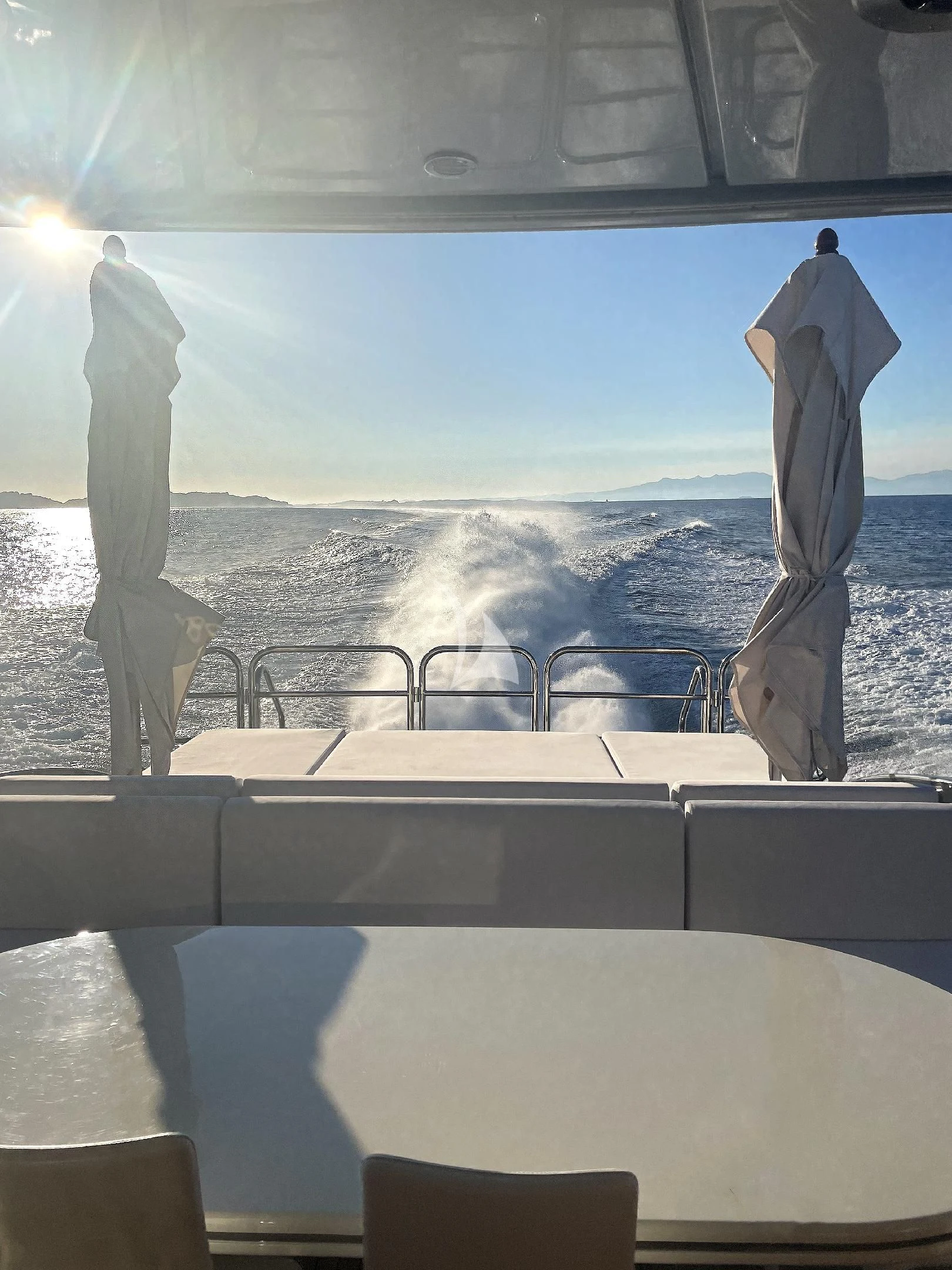 a couple of surfboards on a boat aboard MANU V Yacht for Sale
