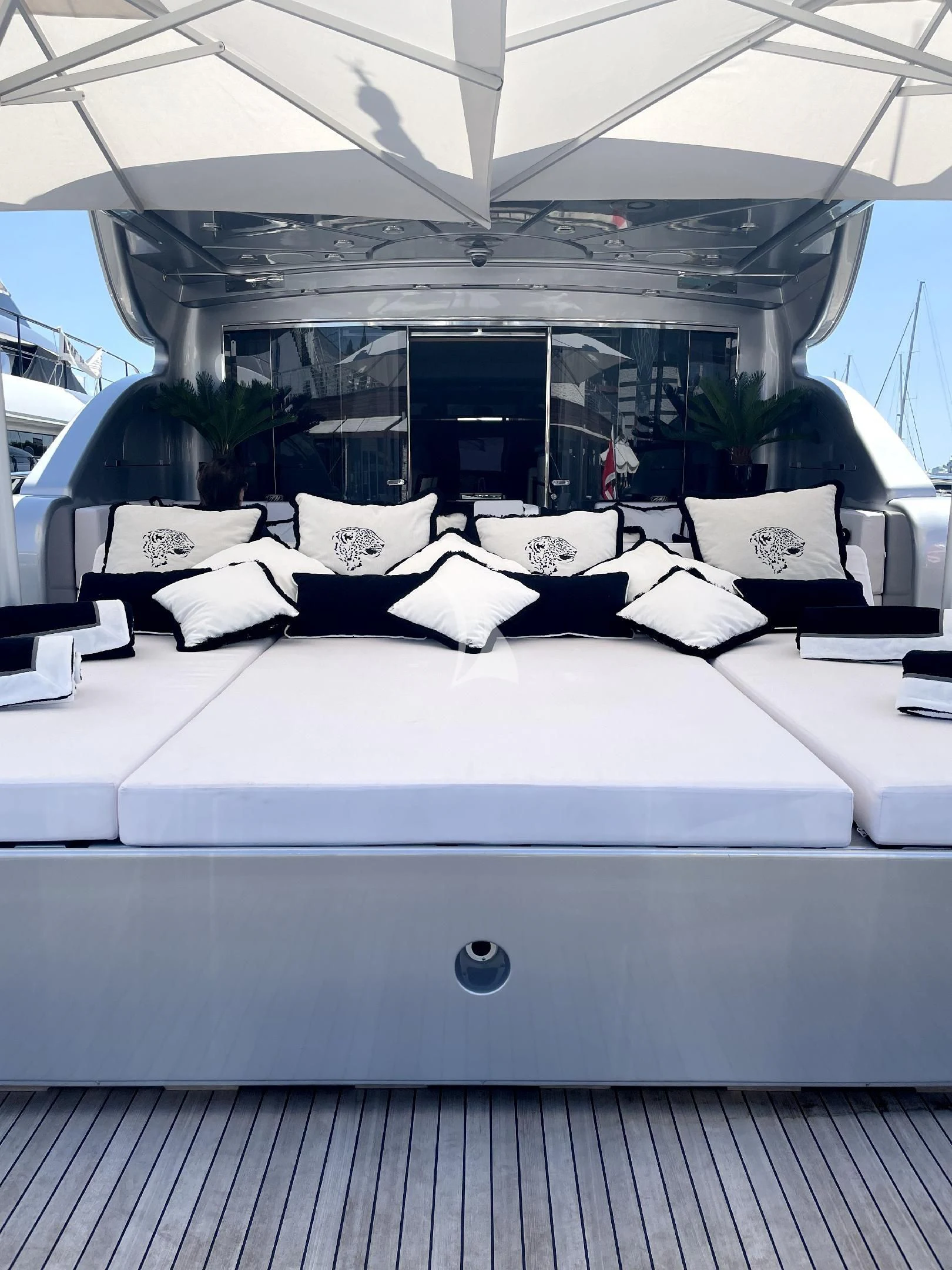 a bed with white sheets aboard MANU V Yacht for Sale