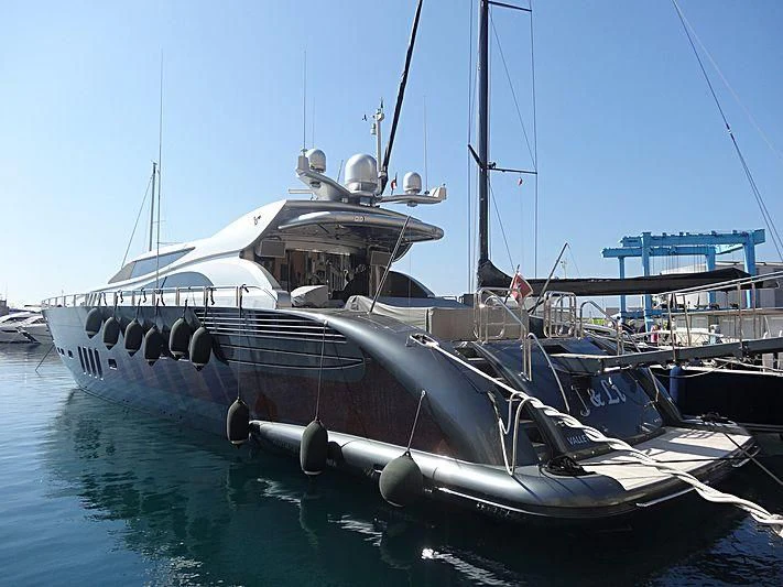 a boat docked at a pier aboard MANU V Yacht for Sale