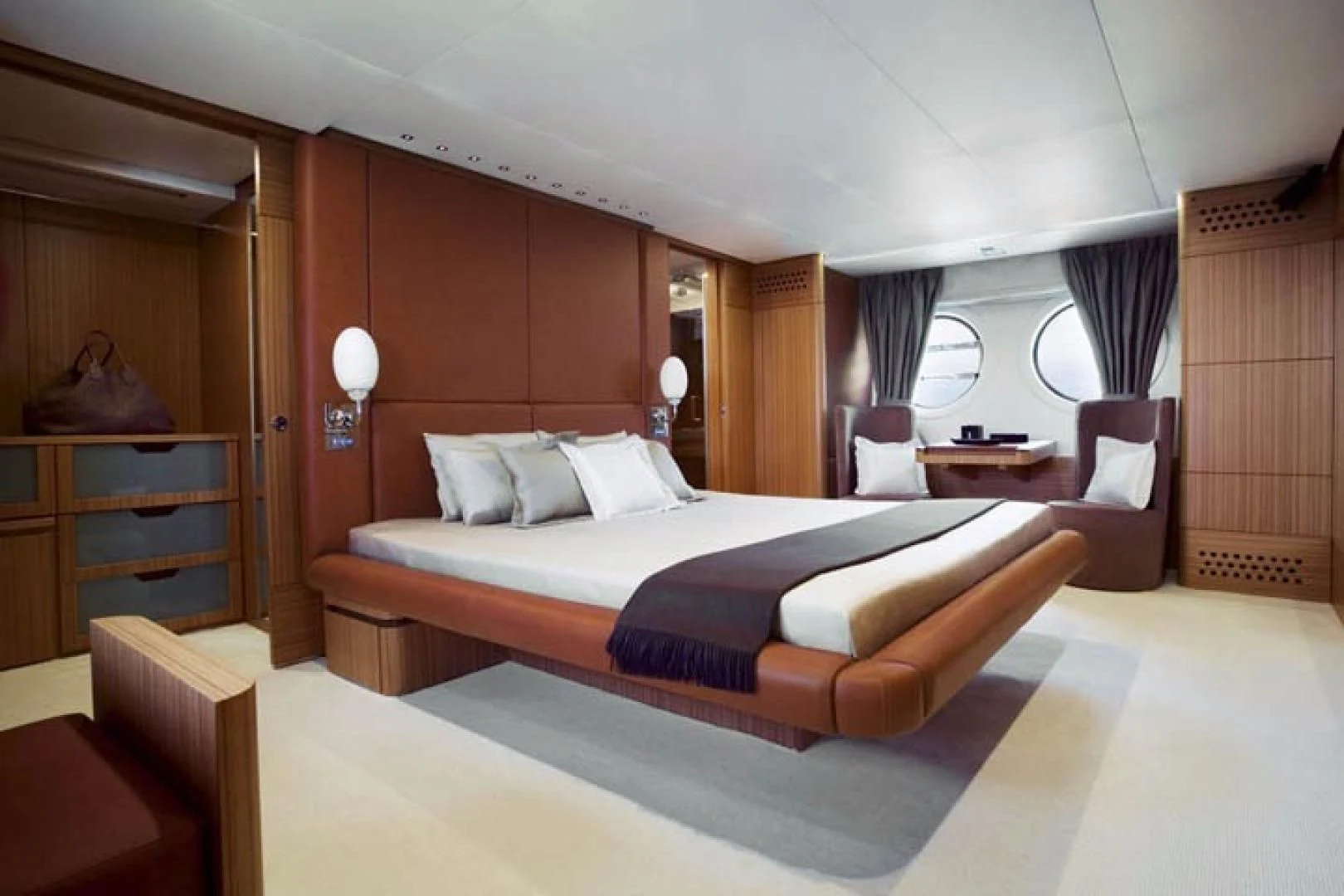 a bed in a room aboard BLUWATER Yacht for Sale