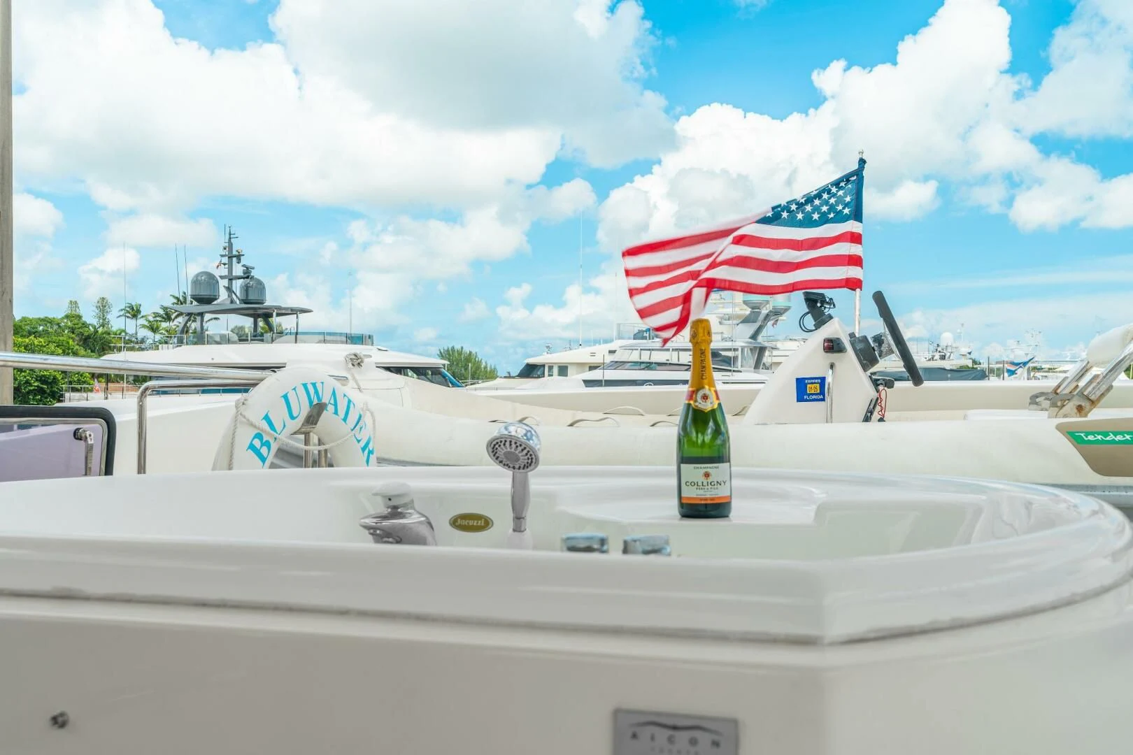 a bottle of beer on a boat aboard BLUWATER Yacht for Sale