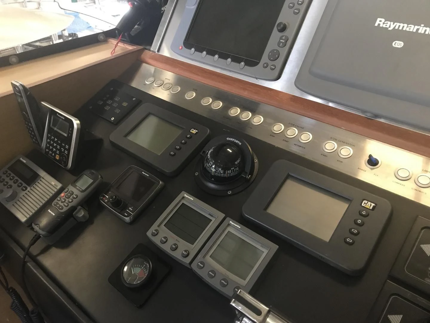 a group of electronic devices aboard BLUWATER Yacht for Sale