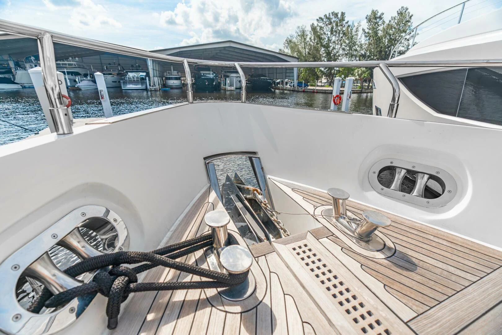 a boat with a steering wheel aboard BLUWATER Yacht for Sale