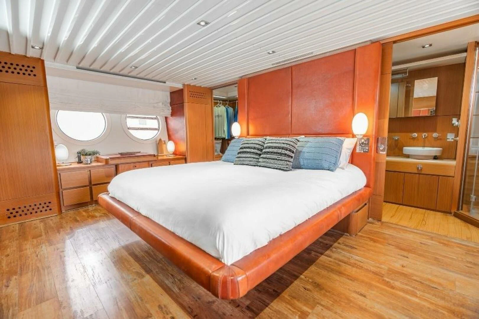 a bed in a room aboard BLUWATER Yacht for Sale