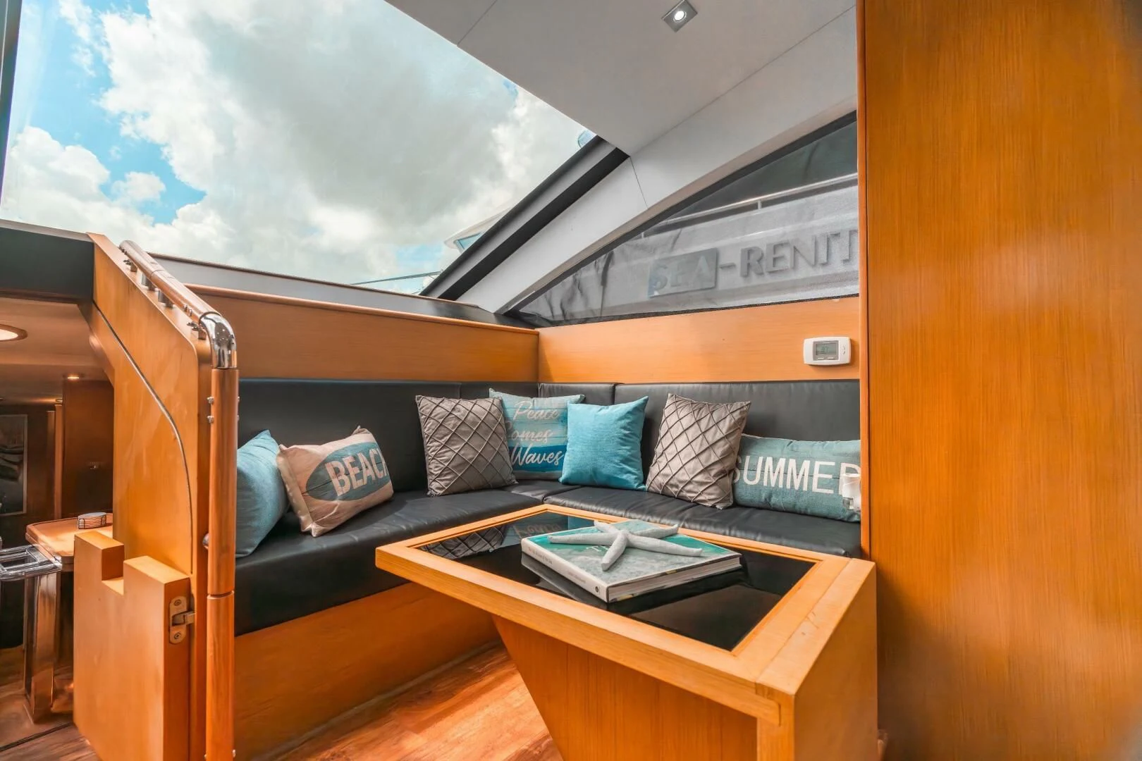 a room with a bed and a desk aboard BLUWATER Yacht for Sale
