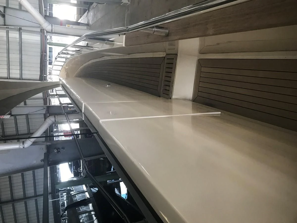 a large room with several escalators aboard BLUWATER Yacht for Sale
