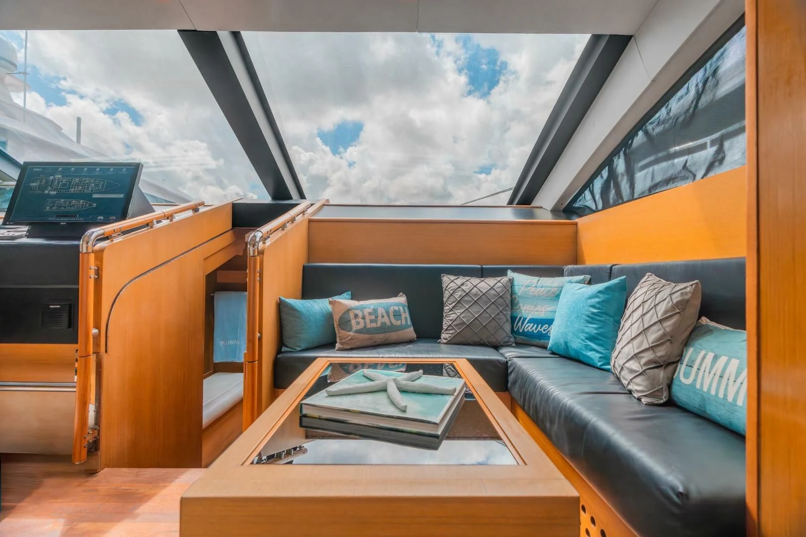 a room with a bed and a desk aboard BLUWATER Yacht for Sale