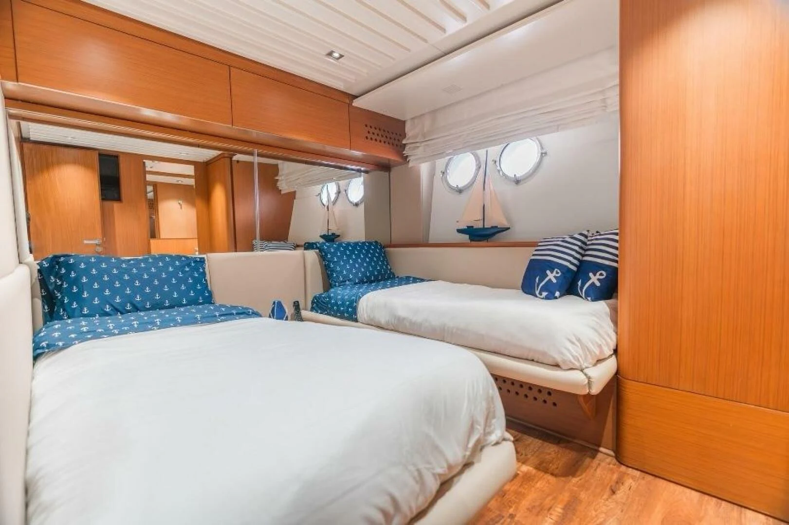 a room with two beds aboard BLUWATER Yacht for Sale