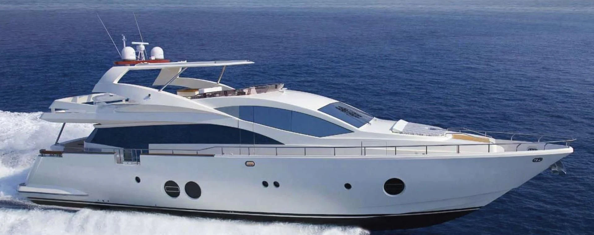 a white yacht on the water aboard BLUWATER Yacht for Sale