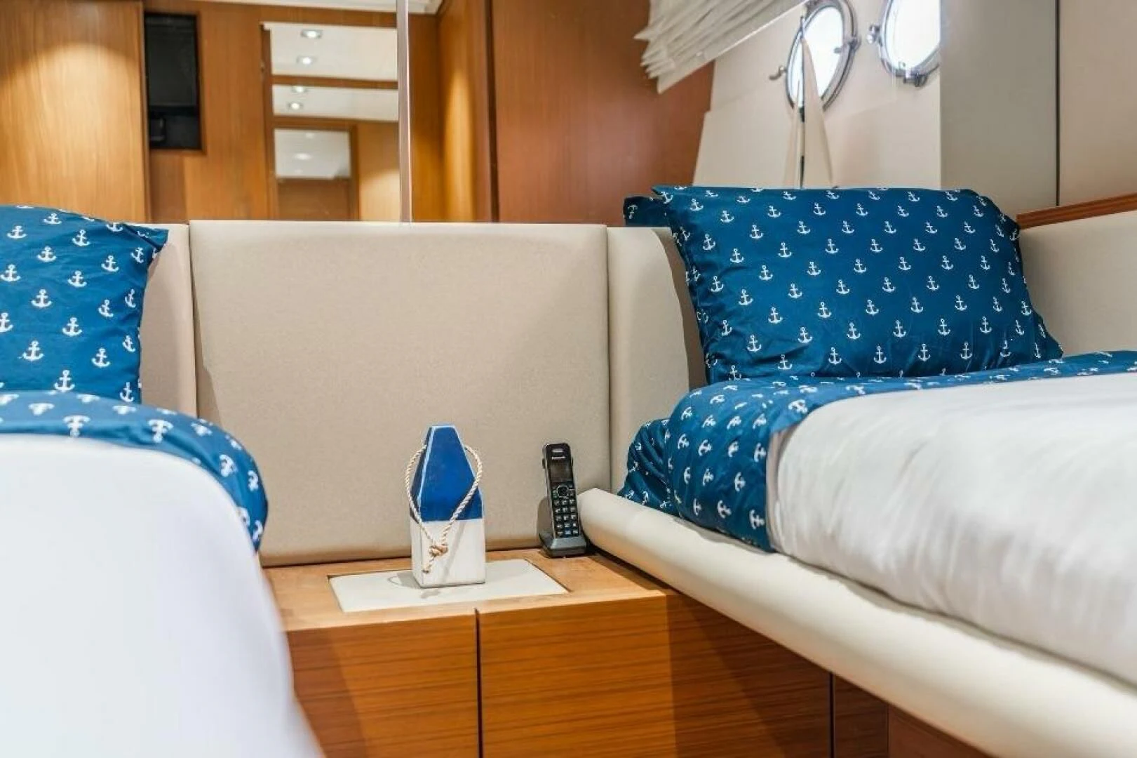 a white coffee cup on a table aboard BLUWATER Yacht for Sale
