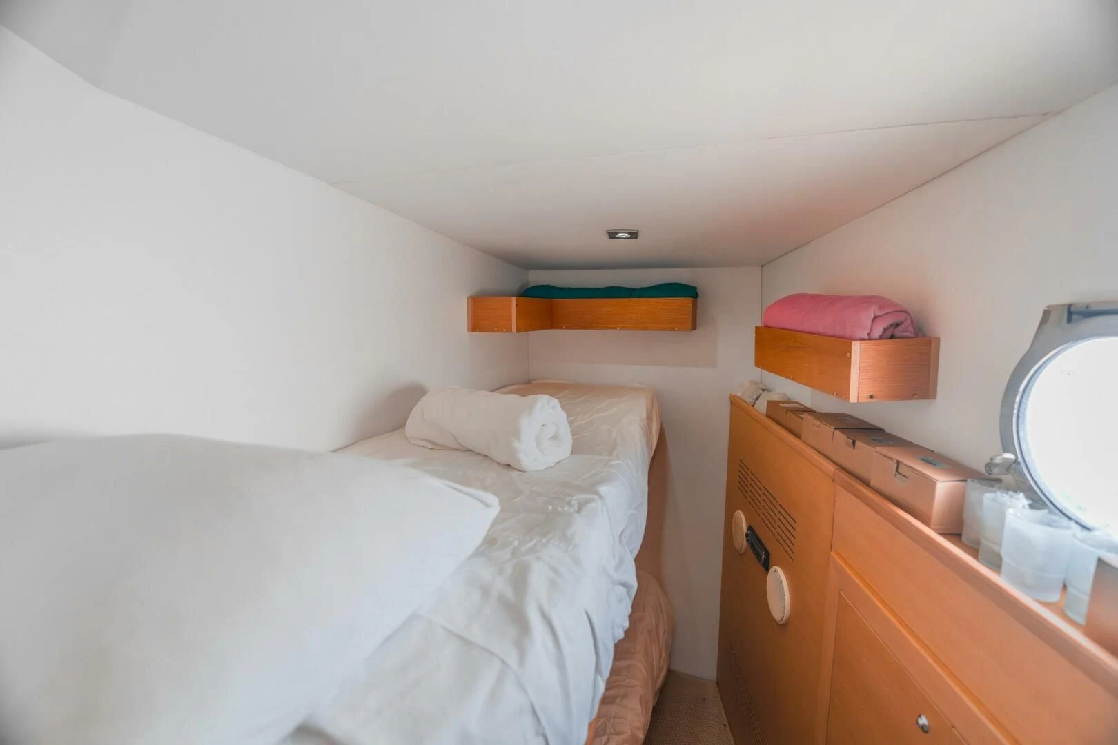 a couple of beds in a small room aboard BLUWATER Yacht for Sale