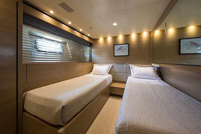 a room with two beds aboard ELEFTHERIA Yacht for Sale