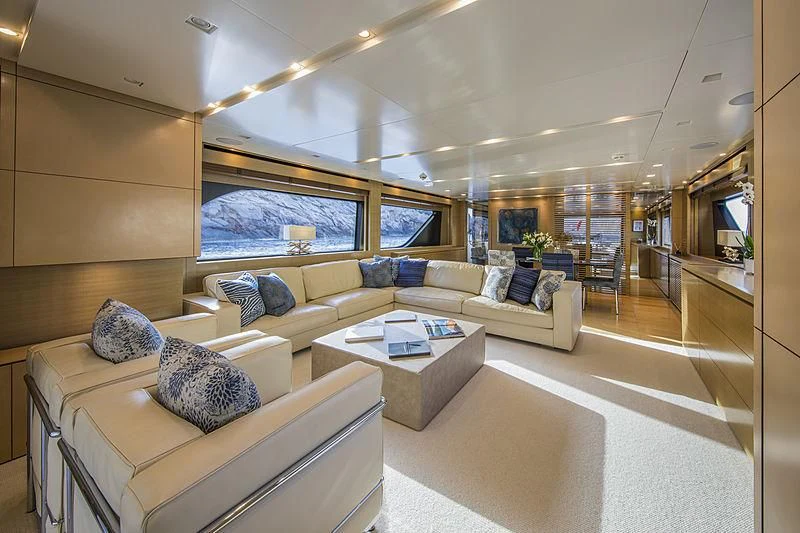a living room with a large window aboard ELEFTHERIA Yacht for Sale