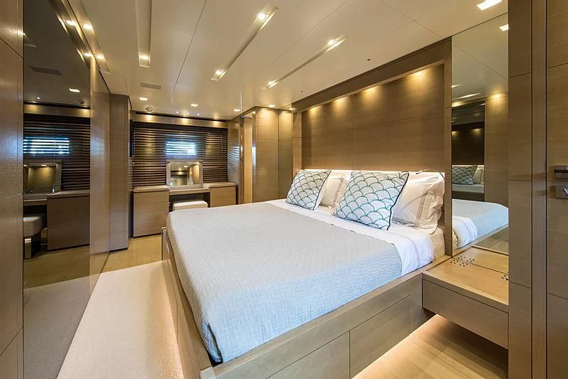 a large bedroom with a large bed aboard ELEFTHERIA Yacht for Sale