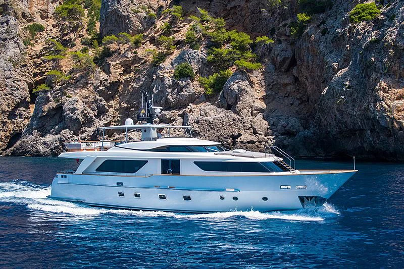a white boat on the water aboard ELEFTHERIA Yacht for Sale