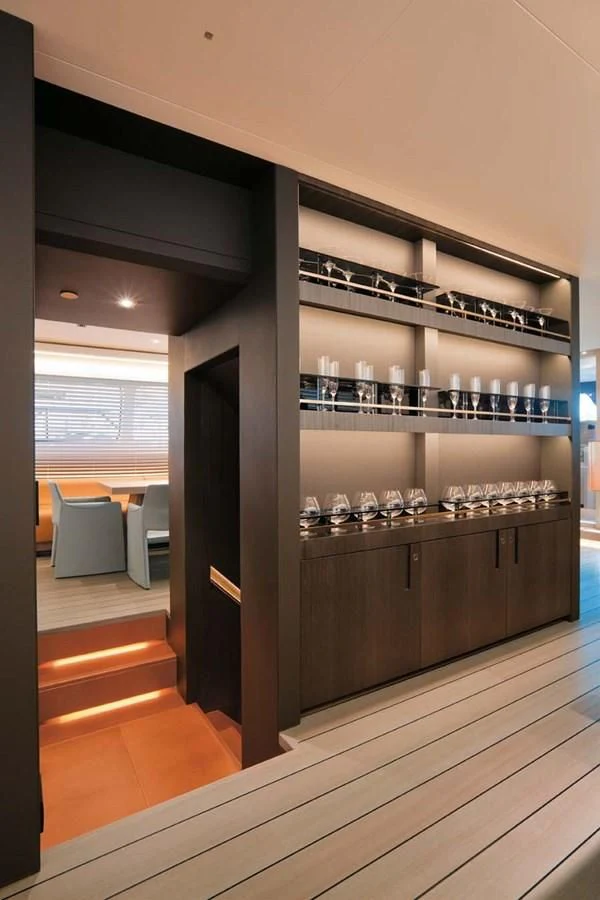 a wine bar with wine glasses aboard ENTERPRISE Yacht for Sale